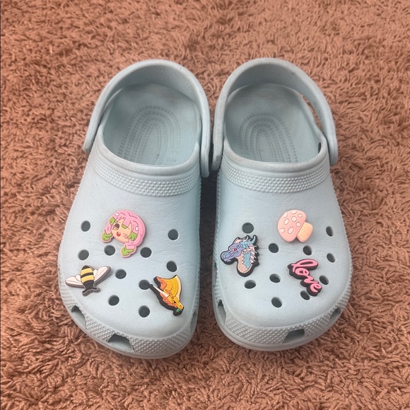 CROCS Other - CROCS Kids Girls Sky Blue Clogs with Playful Charms Size J5